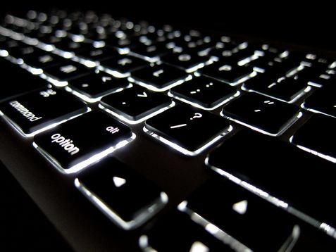 Photo-of-computer-keyboard-focused-on-forward-slash-key.jpg