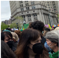 A crowd of people in masks gathered at Foley Square in downtown Manhattan..png