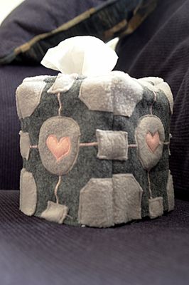 Tissue box in a grey fleece cover with pink hearts sewn on.jpg