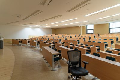 A picture of an empty lecture hall. Photo by Changbok Ko on Unsplash