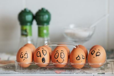 Image of eggs with emotions. Photo by Tengyart on Unsplash