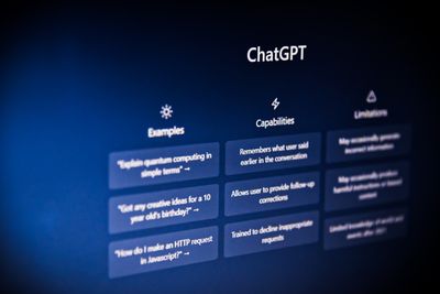 A photo of a computer screen showing the launch page of ChatGPT, which is a list of its features and abilities.jpg