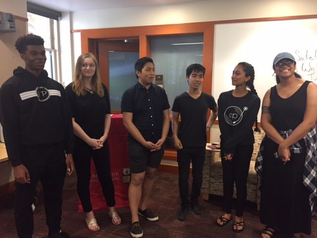 Everyday People acapella group performing in the Hume Center